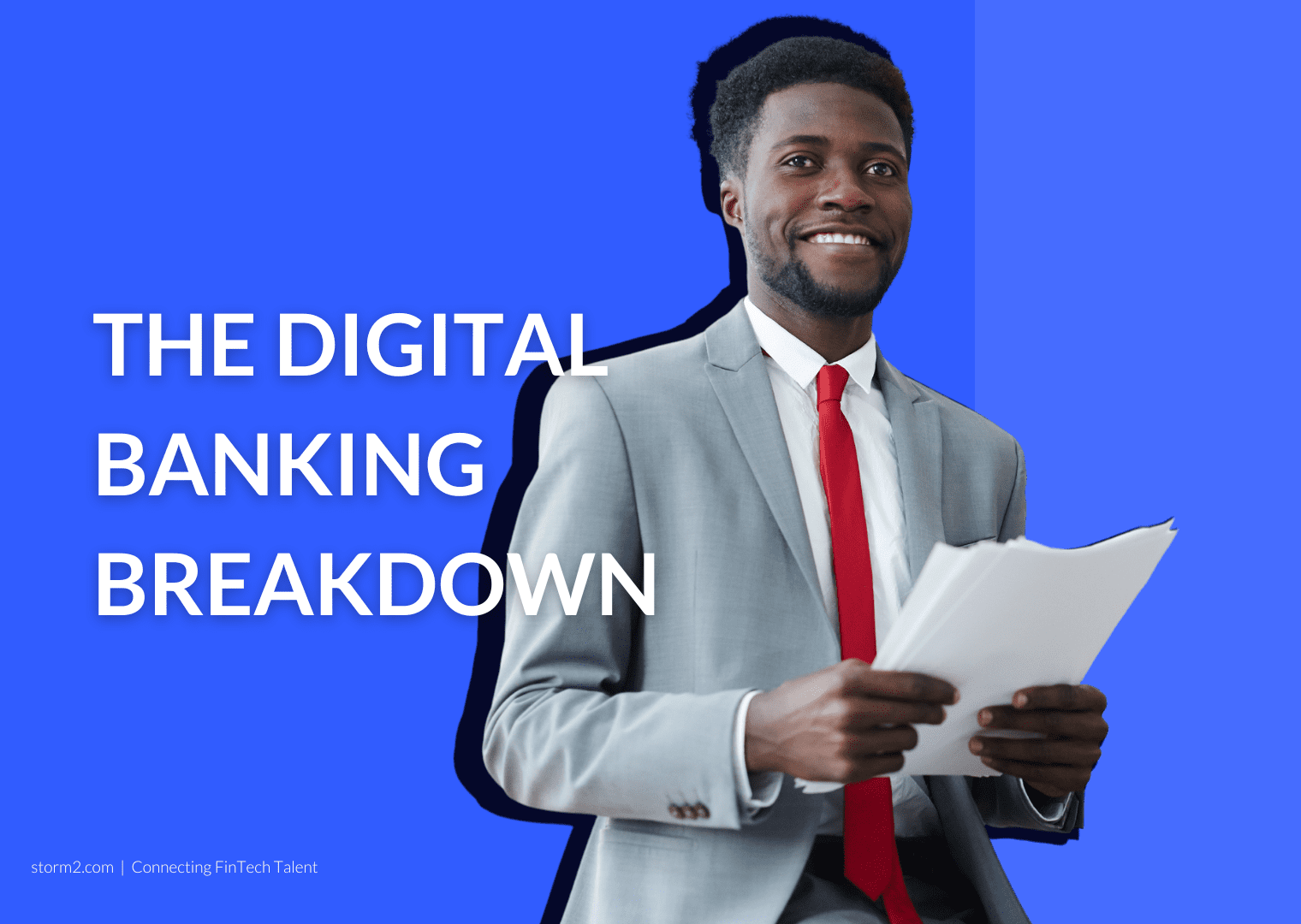 Man in suit holding papers